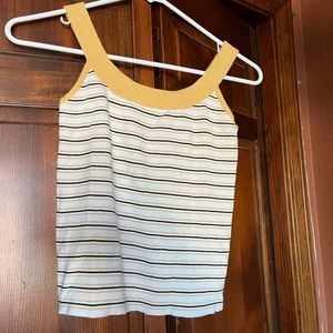 Striped Yellow and White Top
smaller than it looks
was tight on the armpit area